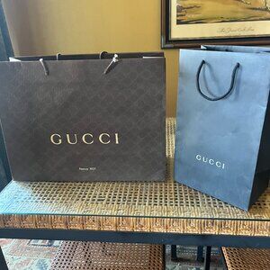 2 GUCCI shopping bags. 14" x 19" & 15" x 9"